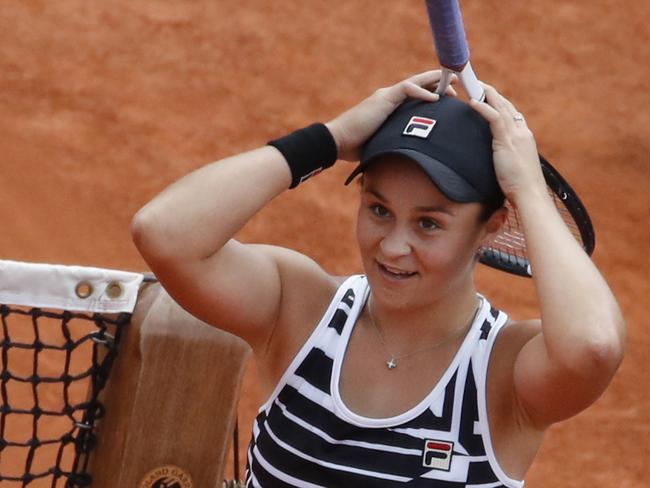 Why wouldn’t she be smiling? Ashleigh Barty celebrates winning the French Open women's final. Picture: AP