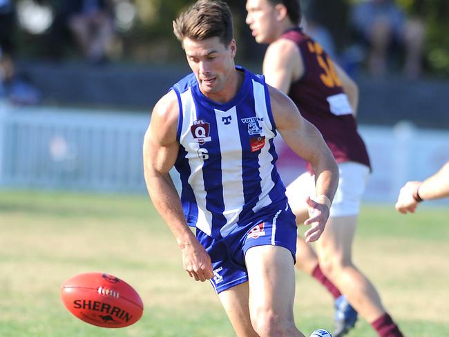 Jonah Licht Action in the QAFL match between Mt Gravatt and Palm Beach. Picture, John Gass.