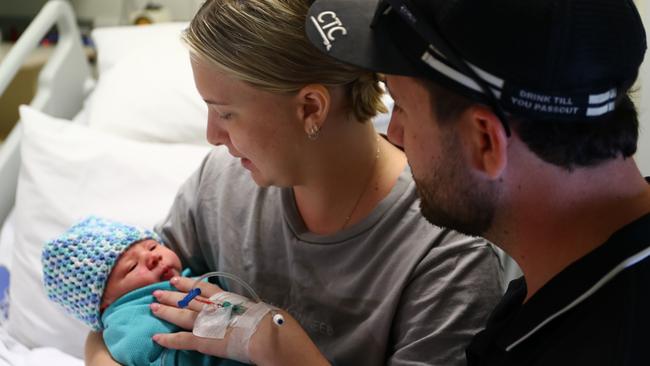 First-time parents Letesha Fyffe and Ryan Dalzell welcomed their son, Hayze Dalzell born at 3.10am on New Year's Day. Hayze is one of the first babies in Cairns to be born into Generation Beta. Photo: Catherine Duffy.