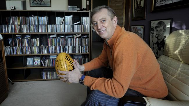 Dennis Cometti at home in his den in Perth. Picture: Theo Fakos.