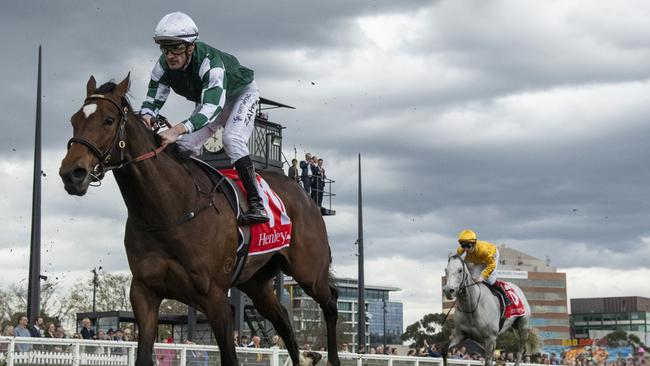 Grey skies for the MRC and Mark Zahra riding Place Du Carrousel during Race 8, the Henley Homes Underwood Stakes at Caulfield Racecourse on September 21. Picture: Vince Caligiuri/Getty Images