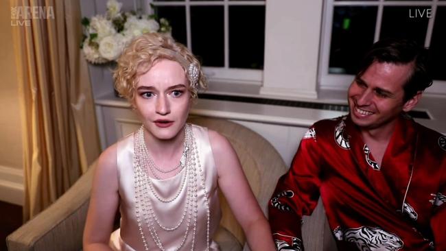 Julia Garner won an Emmy for Ozark, sporting a 1920s-esque outfit (pictured with her husband, Mark Foster). Picture: AFP