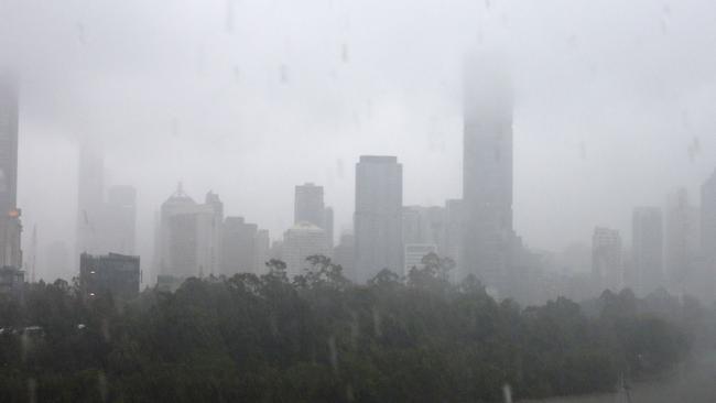 A severe thunderstorm slams into Brisbane. Picture: Josh Woning