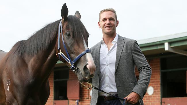 Geelong footballer Joel Selwood with All Star Mile hopeful Grunt