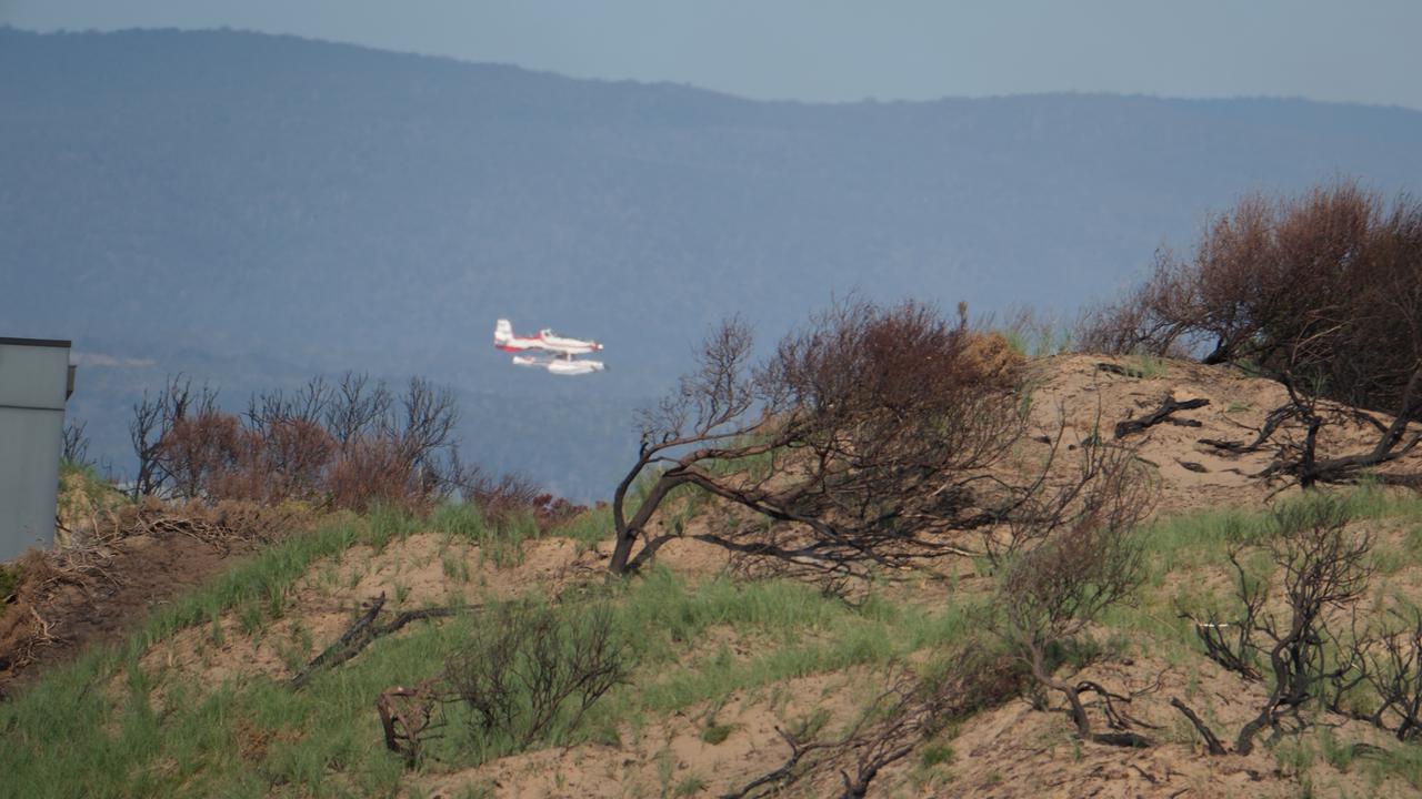 Firefighting efforts at Dolphin Sands. Picture: Tony Fist