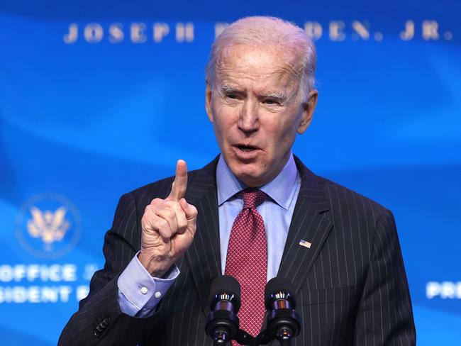 WILMINGTON, DELAWARE - JANUARY 08: U.S. President-elect Joe Biden delivers remarks after he announced cabinet nominees that will round out his economic team, including secretaries of commerce and labor, at The Queen theater on January 08, 2021 in Wilmington, Delaware. Biden announced he is nominating Rhode Island Gov. Gina Raimondo as his commerce secretary, Boston Mayor Martin J. Walsh his labor secretary and Isabel Guzman, a former Obama administration official, as head of the Small Business Administration.   Chip Somodevilla/Getty Images/AFP == FOR NEWSPAPERS, INTERNET, TELCOS & TELEVISION USE ONLY ==