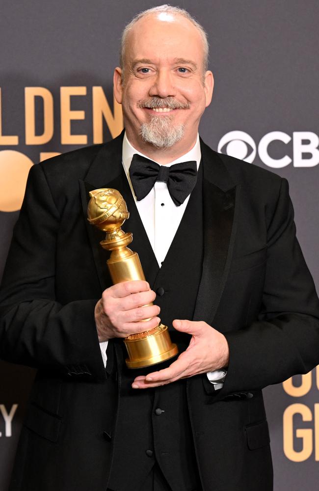 Paul Giamatti posed in the press room with his Globe statue after his big win. Picture: Robyn Beck/AFP