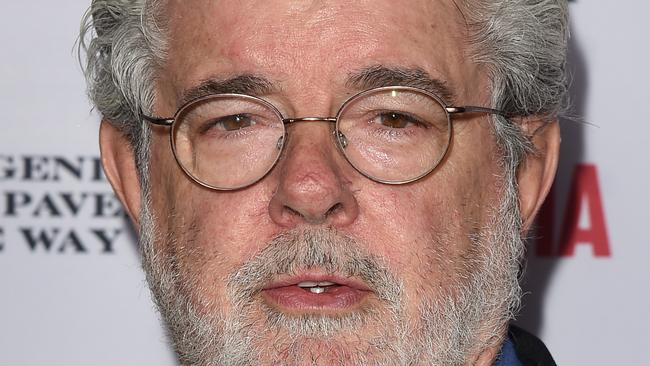 SANTA BARBARA, CA - DECEMBER 06: Director George Lucas (R) and wife Mellody Hobson attend the 'Selma' and the Legends Who Paved the Way gala at Bacara Resort on December 6, 2014 in Goleta, California. (Photo by Jason Merritt/Getty Images)