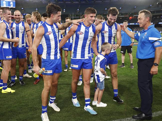 Clarkson celebrates with Jy Simpkin, Harry Sheezel, and Luke McDonald after beating West Coast Eagles at Marvel Stadium in Round 1 (Photo by Daniel Pockett/Getty Images)