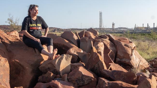Indigenous activist Raelene Cooper, one of the founders of Save Our Songlines, in front of the North West Shelf gas project.