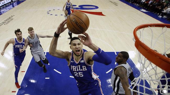 Philadelphia 76ers' Ben Simmons goes up for a shot past San Antonio Spurs' LaMarcus Aldridge. Picture: AP Photo/Matt Slocum