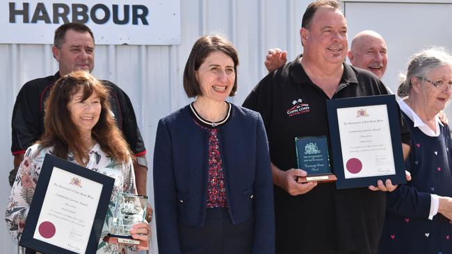 NSW Premier Gladys Berejiklian presented locals Dean Evers and Aunty Kerrie Burnet with Community Service Awards in Coffs Harbour on October 26.