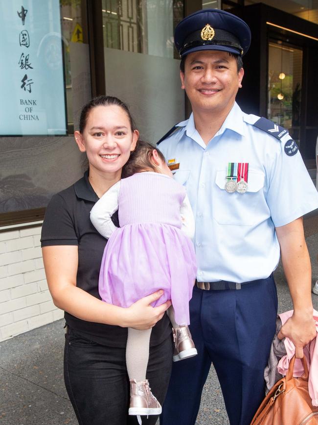 Thousands of people have braved the rain to gather in Brisbane for Anzac Day services. Picture: Grace Kessels