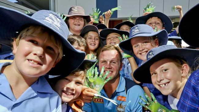 Titans NRL player Tom Kingston helping kids tackle bullying at Tweed St Josephs Primary School. . Picture: Nolan Verheij-Full