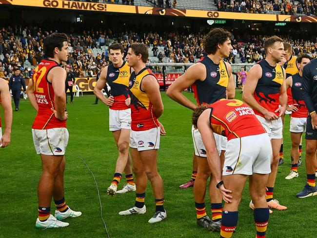 MELBOURNE, AUSTRALIA - JUNE 01: Crows players react following the round 12 AFL match between Hawthorn Hawks and Adelaide Crows at Melbourne Cricket Ground, on June 01, 2024, in Melbourne, Australia. (Photo by Morgan Hancock/AFL Photos/via Getty Images)