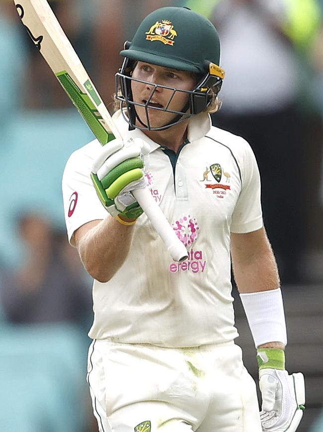 Pucovski raises his bat after his maiden fifty at the SCG. Picture. Phil Hillyard