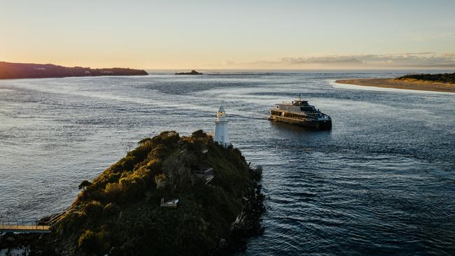 The Spirit of the Wild glides around Macquarie Harbour during the Clover Hill sunset cruise. Picture: Supplied.