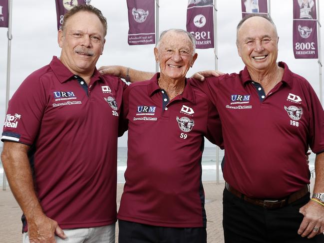 Manly Sea Eagles legends Cliff Lyons, Ken Arthurson and Max Krilich at Manly Beach where the promenade has been lined with flags of Manly players ahead of the clubs 75th anniversary. Picture: Jonathan Ng