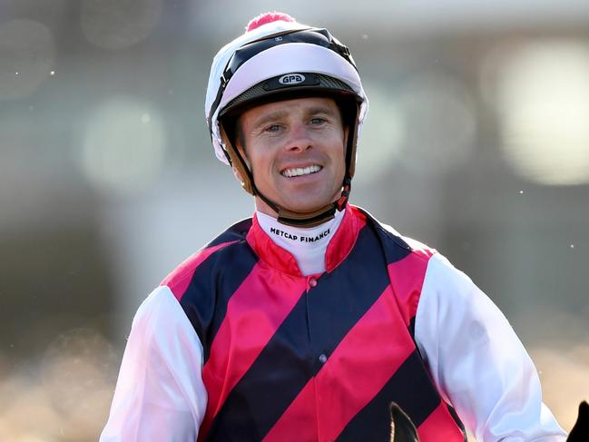 MELBOURNE, AUSTRALIA - NOVEMBER 11: Jye McNeil riding Rey Magnerio wins the World Horse Racing Grand Handicap during Stakes Day at Flemington Racecourse on November 11, 2023 in Melbourne, Australia. (Photo by Josh Chadwick/Getty Images)