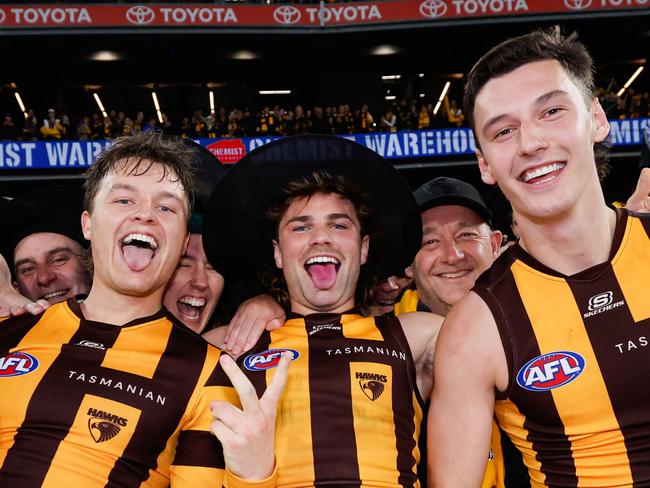 MELBOURNE, AUSTRALIA - SEPTEMBER 06: Jack Ginnivan, Nick Watson and Connor Macdonald of the Hawks pose for a photo during the 2024 AFL Second Elimination Final match between the Western Bulldogs and the Hawthorn Hawks at The Melbourne Cricket Ground on September 06, 2024 in Melbourne, Australia. (Photo by Dylan Burns/AFL Photos via Getty Images)