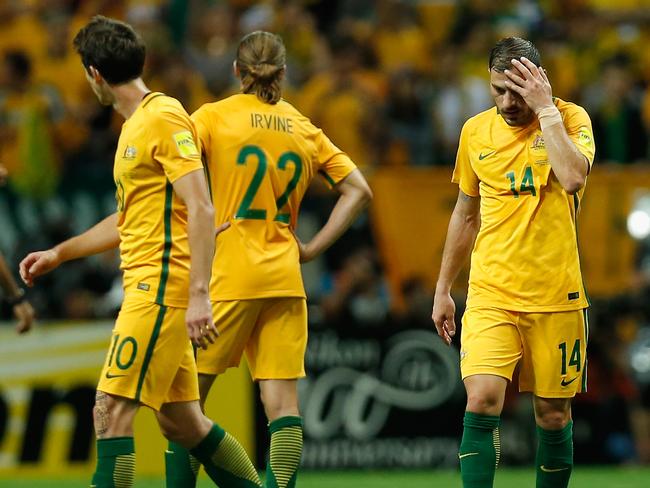 Dejected Australia players after the loss.