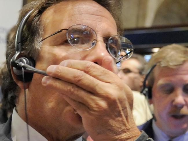 Traders work on the New York Stock Exchange floor, New York, 06/10/2008. Wall Street tumbled again, joining a sell-off around the world as fears grew that the financial crisis will cascade through economies globally despite bailout efforts by the US and other governments.