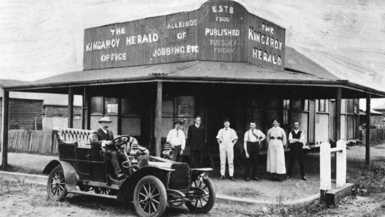 Mr Archibald Blue, the Kingaroy Herald’s founding manager, seated in a French Darracq car alongside staff in front of the paper’s building. Source: John Oxley Library, State Library of Queensland, ca. 1910s