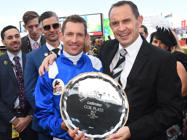 Dynamo duo: Hugh Bowman and trainer Chris Waller with their third Cox Plate. Picture: Getty Images