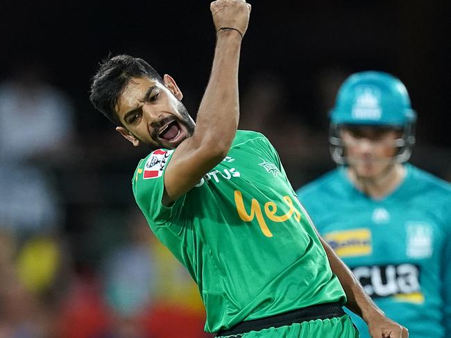 Haris Rauf celebrates the wicket of Heat batsman Max Bryant. Picture: AAP/Dave Hunt