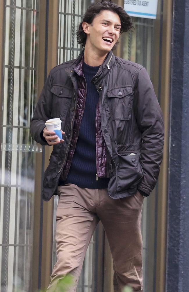 The young royal was all smiles on his coffee run. Picture: MediaMode.com