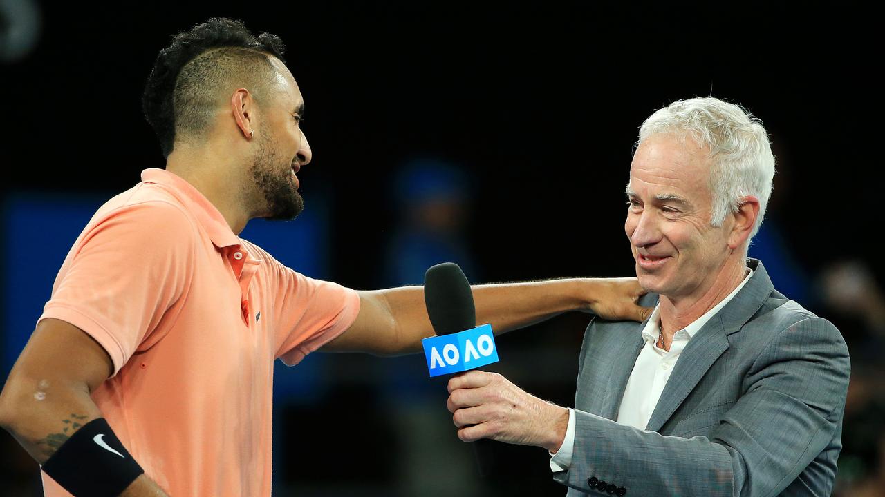 Nick Kyrgios shares a touching moment with John McEnroe. Picture: Mark Stewart