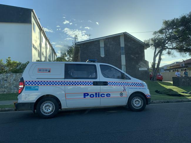 Police outside a Gladstone residence where the body of a person was discovered this afternoon.