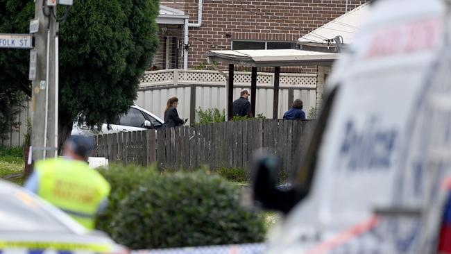 Officers speak to potential witnesses this morning in Blacktown. Picture: NCA NewsWire / Jeremy Piper