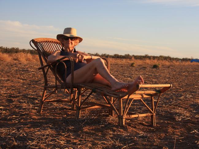 Pat Regan, 88, as she appears “Waiting for Rain” in the Beach to Bush calendar. Picture: Sue Currey