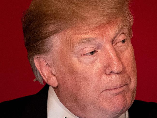 US President Donald Trump pauses while speaking during White House Historical Association Dinner in the East Room of the White House on May 15, 2019, in Washington, DC. (Photo by Brendan Smialowski / AFP)