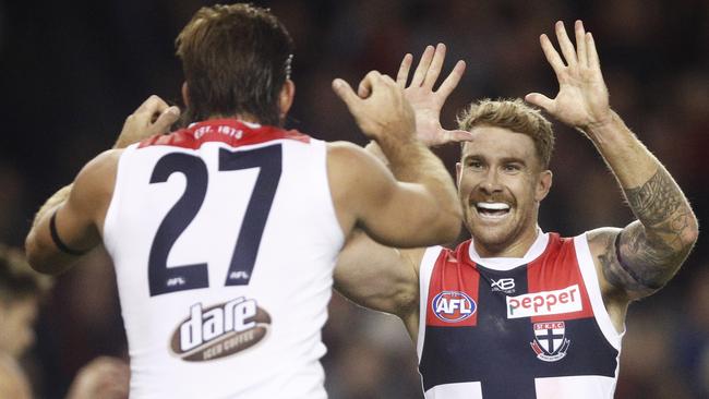 Dean Kent of the Saints (right) celebrates a goal during the Round 2 AFL match between the Essendon Bombers and St Kilda Saints at Marvel Stadium, Melbourne, Saturday, March 30, 2019. (AAP Image/Daniel Pockett) NO ARCHIVING, EDITORIAL USE ONLY