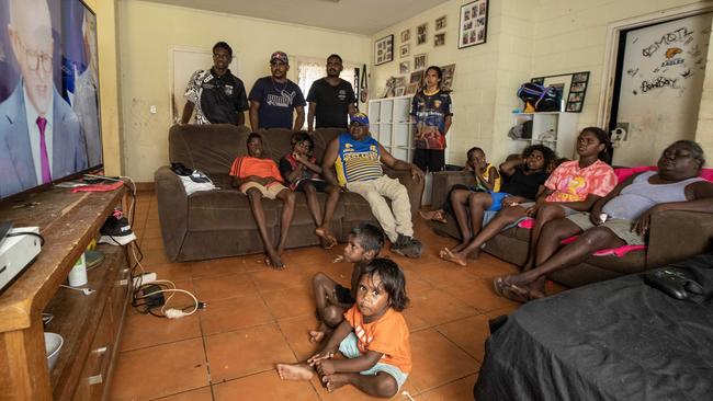 Phillip Goodman and family watch the Prime Minister’s announcement from their home near Darwin. Picture: Liam Mendes