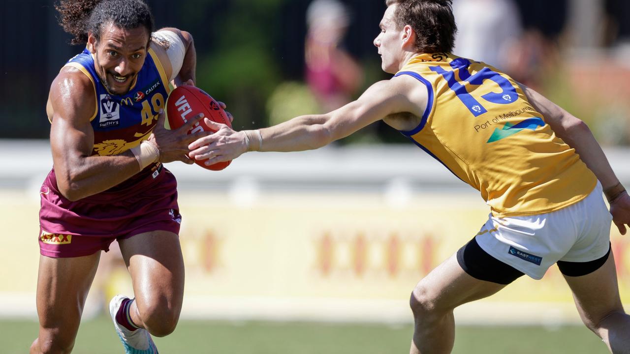 SPRINGFIELD, AUSTRALIA - AUGUST 12: Bruce Reville of the Lions in action during the 2023 VFL round 21 match between the Brisbane Lions and Williamstown at Brighton Homes Arena on August 12, 2023 in Springfield, Queensland. (Photo by Russell Freeman/AFL Photos via Getty Images)