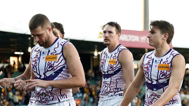 LAUNCESTON, AUSTRALIA - JULY 13: Dockers players look dejected after a loss during the 2024 AFL Round 18 match between the Hawthorn Hawks and the Fremantle Dockers at the UTAS Stadium on July 13, 2024 in Launceston, Australia. (Photo by Michael Willson/AFL Photos via Getty Images)