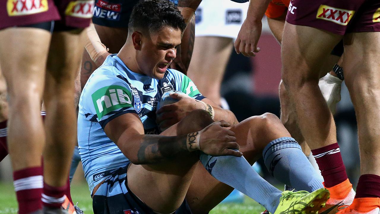 BRISBANE, AUSTRALIA — JUNE 05: Latrell Mitchell of the Blues reacts after a tackle during game one of the 2019 State of Origin series between the Queensland Maroons and the New South Wales Blues at Suncorp Stadium on June 05, 2019 in Brisbane, Australia. (Photo by Jono Searle/Getty Images)