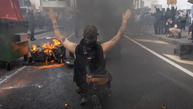 Protesters attempt to establish a barricade on the Clarendon Street Bridge in Melbourne during demonstrations earlier this month. Picture: Jake Nowakowski