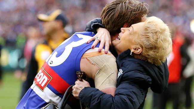 Western Bulldogs Jordan Roughead embraces Susan Alberti. Picture: Mark Stewart