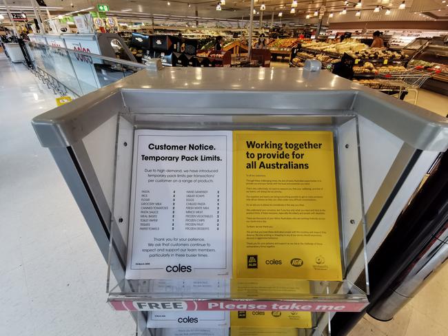 A notice informing customers of new restrictions at Coles Supermarkets. Picture: AAP Image/James Gourley