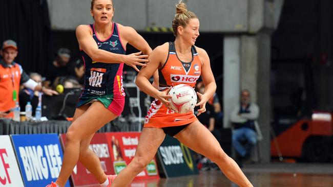 Jamie-Lee Price is action for Giants Netball during the Super Netball competition.