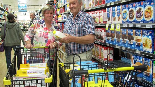 COUNTRY COMFORT: Marlene Owen and Tony Stewart stock up for their next delivery to drought-hit outback Queensland. Picture: Arthur Gorrie