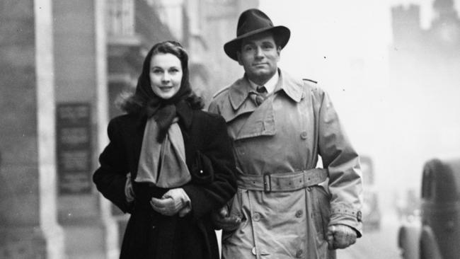 Laurence Olivier and Vivien Leigh after visiting a London theatre to see a revival of 'Dear Brutus'.