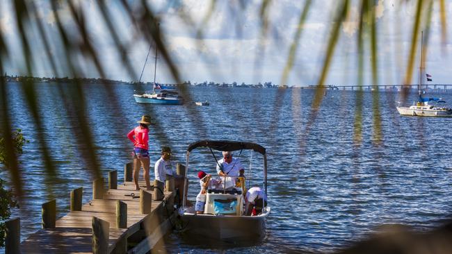 People board a boat in Melbourne, Florida. Picture: Saul Martinez