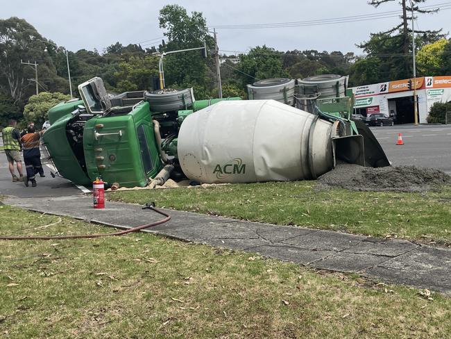 A cement truck has tipped in Croydon.