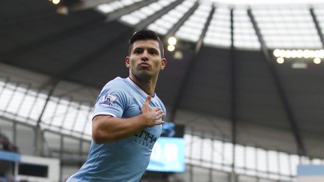 FILE - This is a Saturday Dec. 14, 2013 file photo of Manchester City's Sergio Aguero as hecelebrates after scoring against Arsenal during their English Premier League soccer match at the Etihad Stadium, Manchester, England. The new English Premier League season starts on Saturday Aug. 16, 2014. (AP Photo/Jon Super, File)