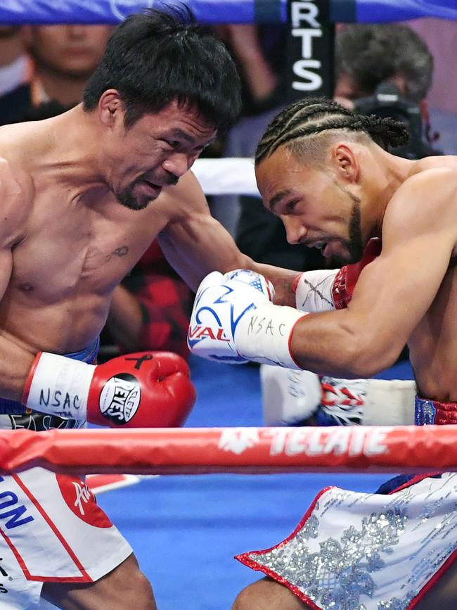 Manny Pacquiao (L) will make a boxing comeback in July. Picture: Ethan Miller/Getty Images